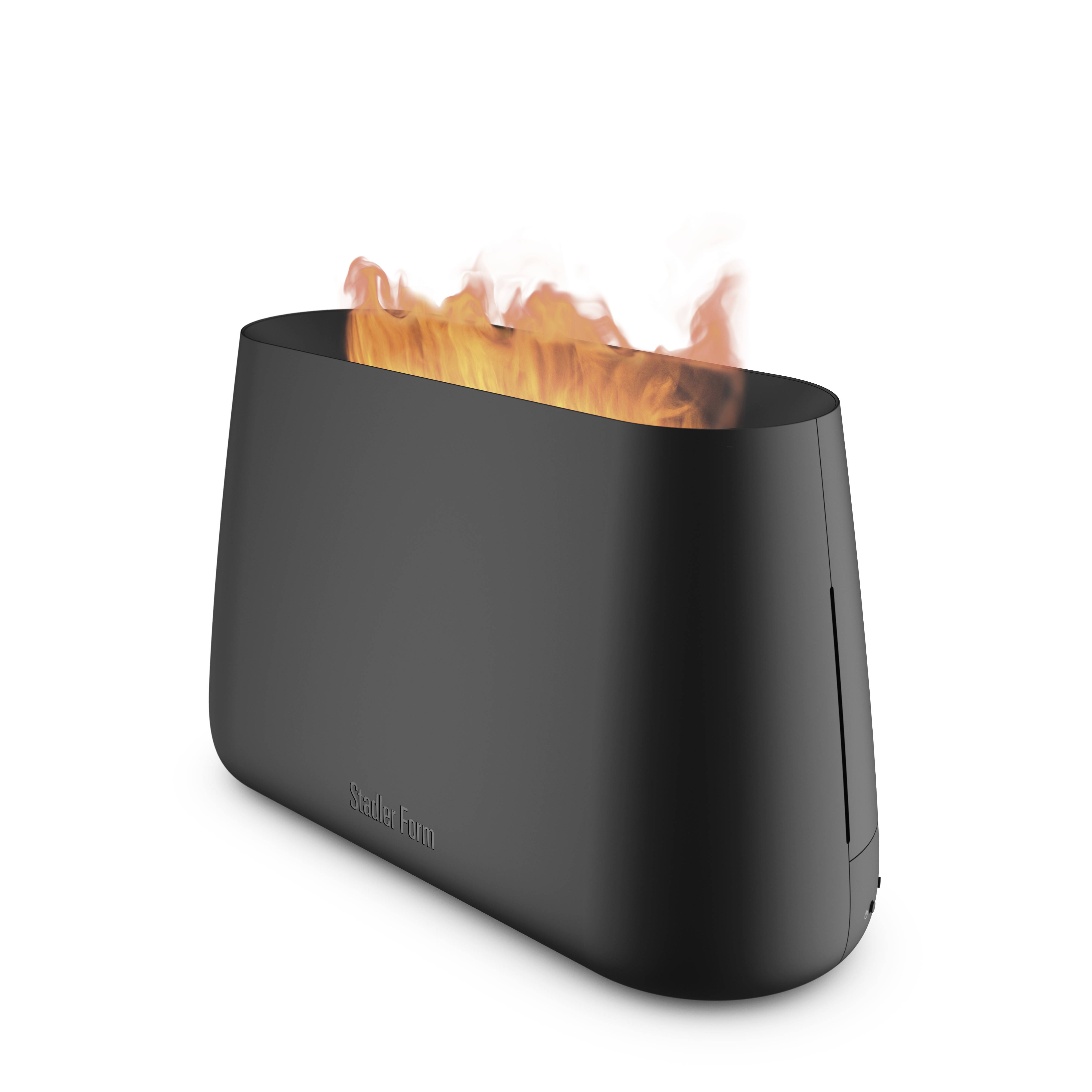 A black, modern tabletop fireplace, with flames rising from it.