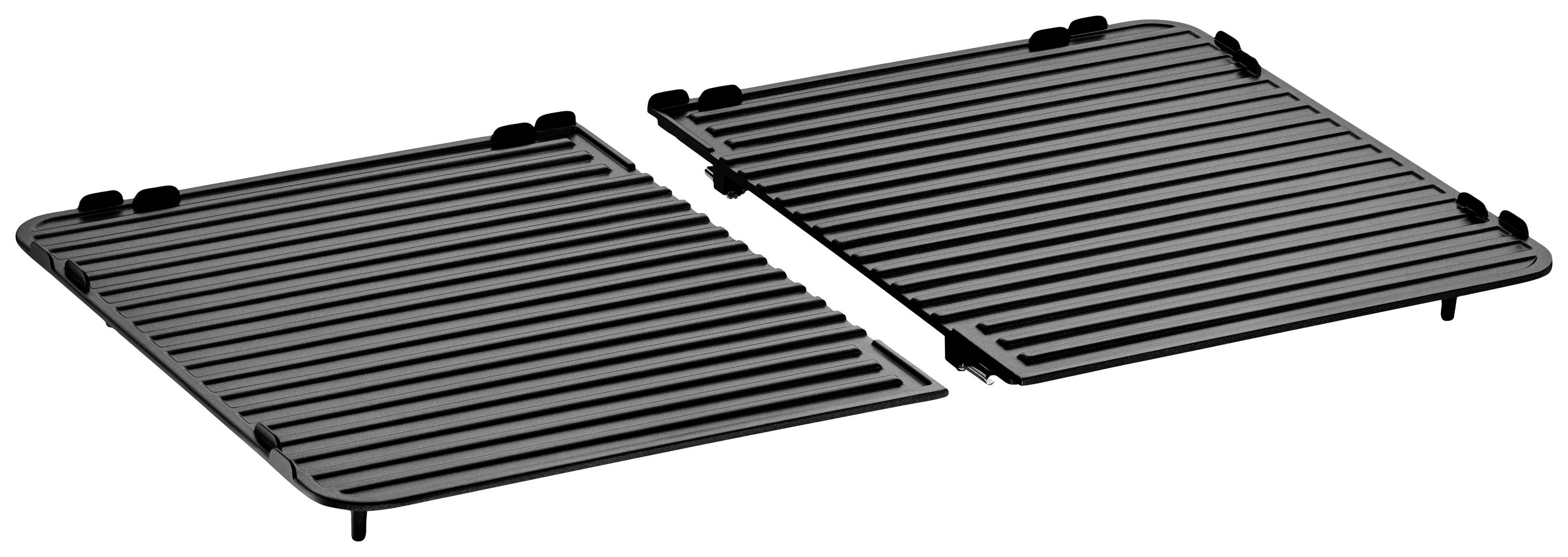 Two black, rectangular griddle plates side by side. Each plate has parallel grooves and small feet at the corners.