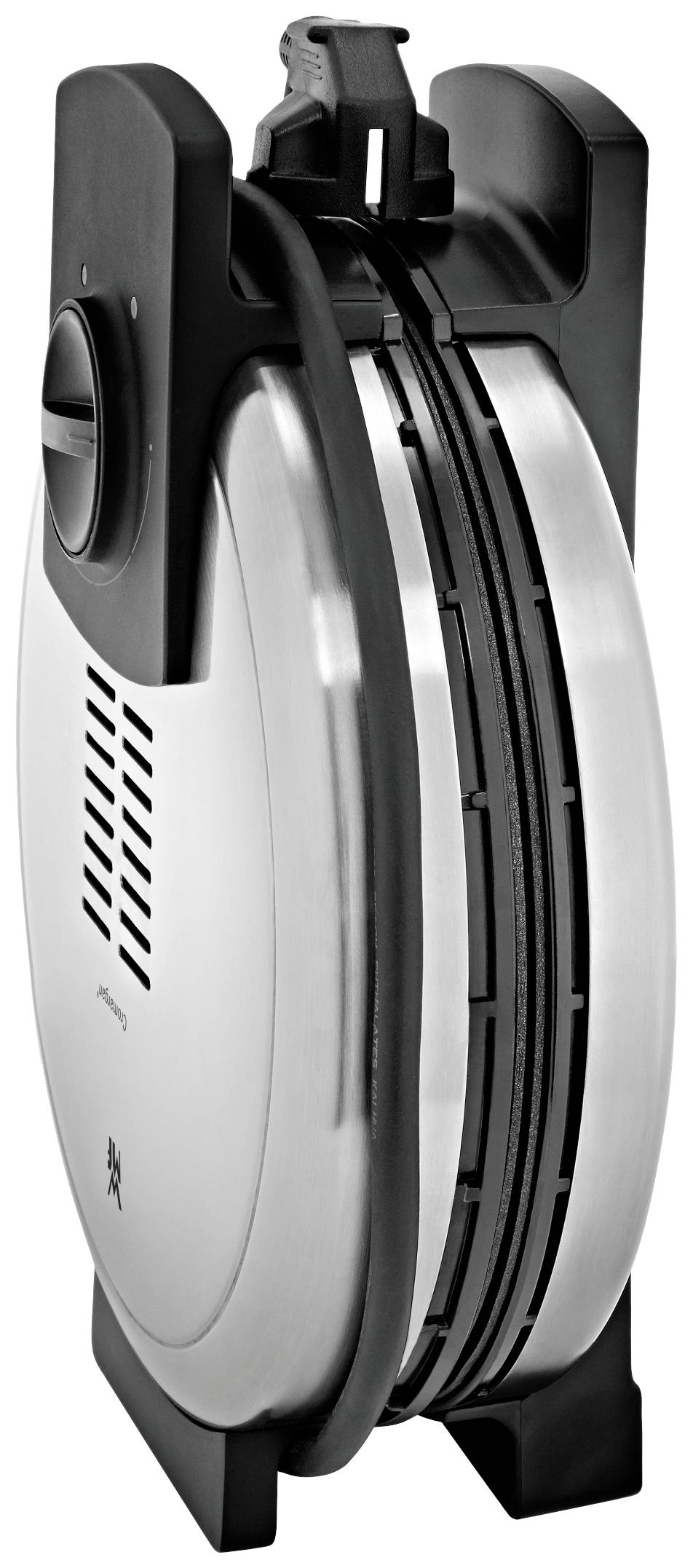 A modern, vertically standing waffle maker, black and silver, with round, glossy surfaces and a temperature control dial.