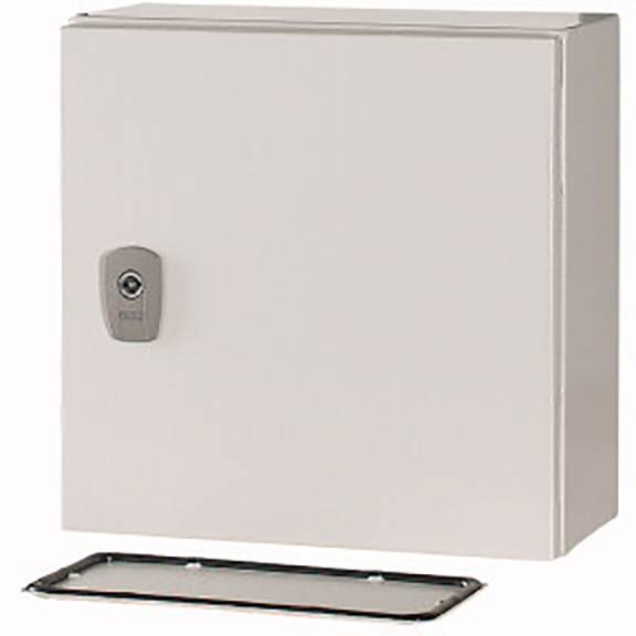 A rectangular, light grey metal cabinet with a small lock on the left side. A removed front panel lies in front of it.