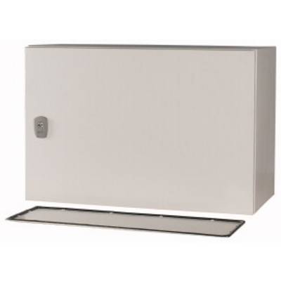 Rectangular grey metal electrical cabinet with a lock, with its lid removed and lying on the ground. Suitable for wall mounting.