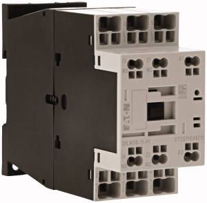 A black and white electrical contactor with multiple connection terminals, used in switching systems to control electrical circuits.