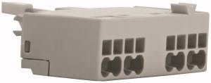 White electric multi-socket power strip with several socket outlets and a mounting clip on the top surface.