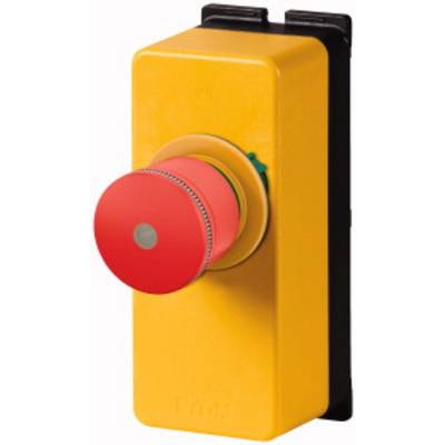 Emergency stop button in yellow and red, mounted on a wall, prevents the operation of a machine or system by pressing.