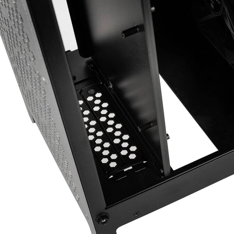 The excerpt shows the interior of a computer case in black with ventilation slots and mounting rails for components.