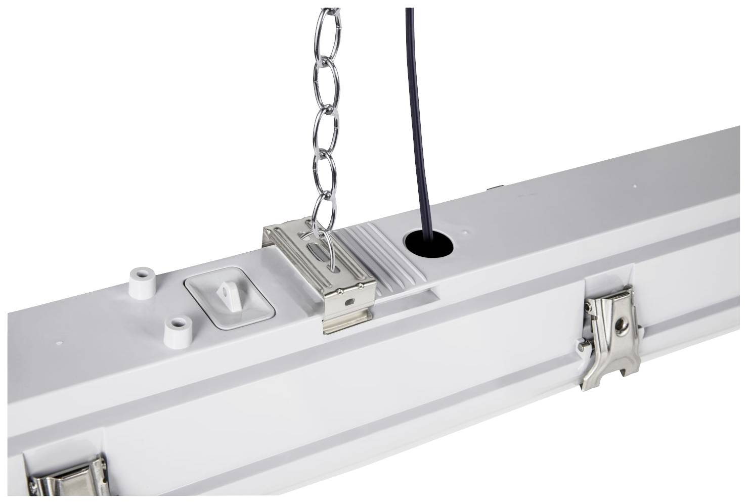 A rectangular LED panel housing in close-up, with a chain for mounting and a protruding cable.
