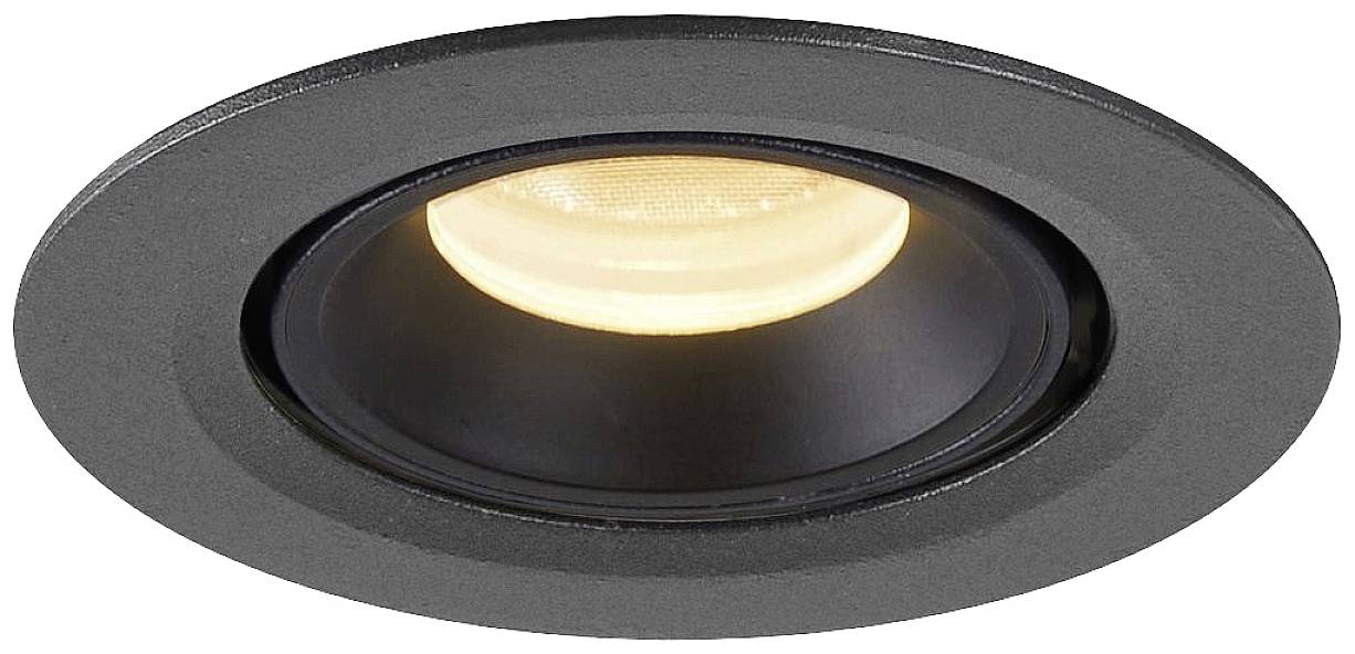 Black round LED recessed spotlight with warm light, embedded in a ceiling.