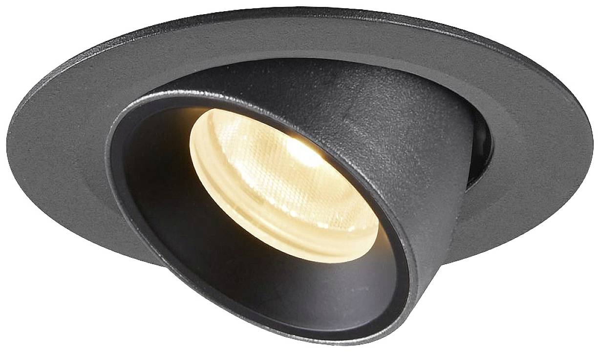 A black recessed ceiling light with a pivoting spot emits warm light. It is suitable for targeted lighting in interior spaces.