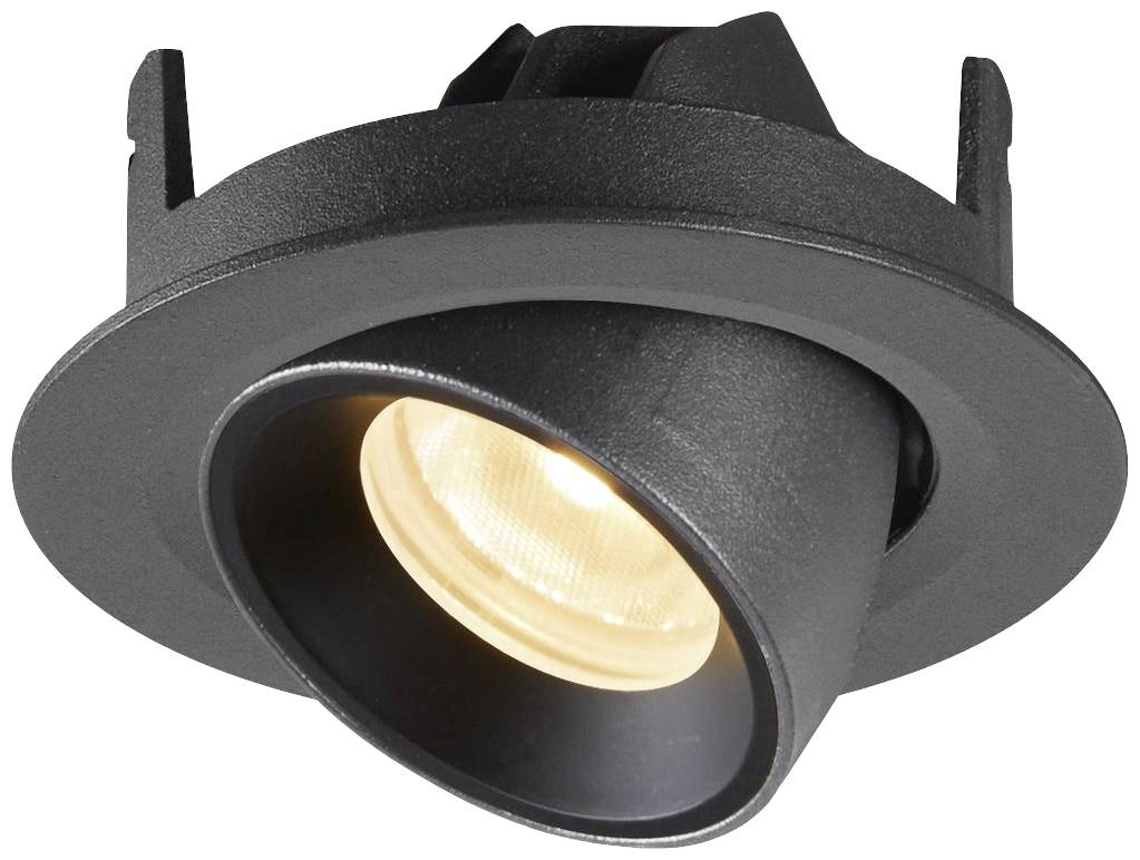 Black recessed spotlight with a round frame illuminates an area. Suitable for targeted lighting in modern interiors.