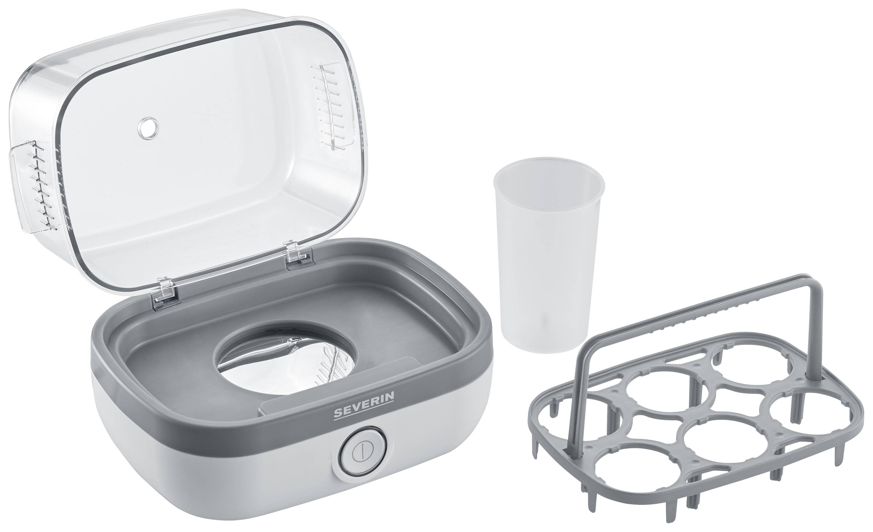 An electric egg cooker with an open lid, a measuring cup, and an egg holder capable of holding up to six eggs.