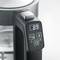 Electric kettle with digital display and temperature indicator. Shows 99 degrees.