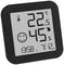 Digital thermometer-hygrometer with a black frame shows 22.5 degrees Celsius, 45% humidity and a time of 13:58.