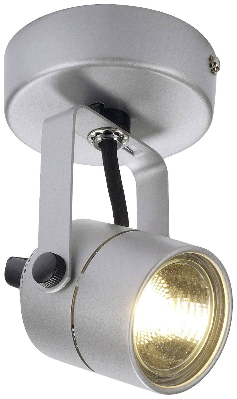 Silver ceiling spotlight with a cylindrical head and adjustable joint, switched on and illuminating.