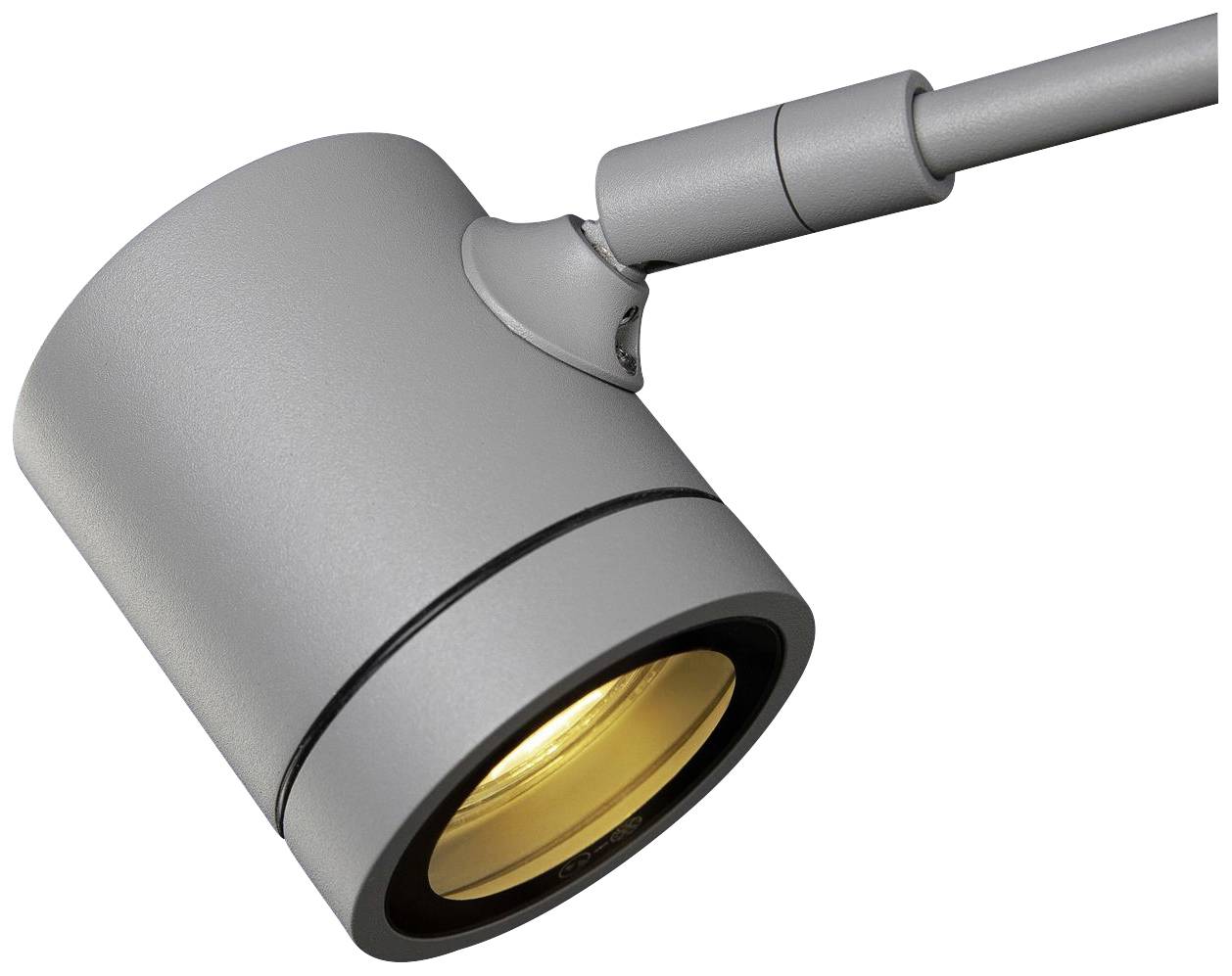 Silver cylindrical ceiling lamp with a rotatable head and warm white light beam, suitable for focused lighting.