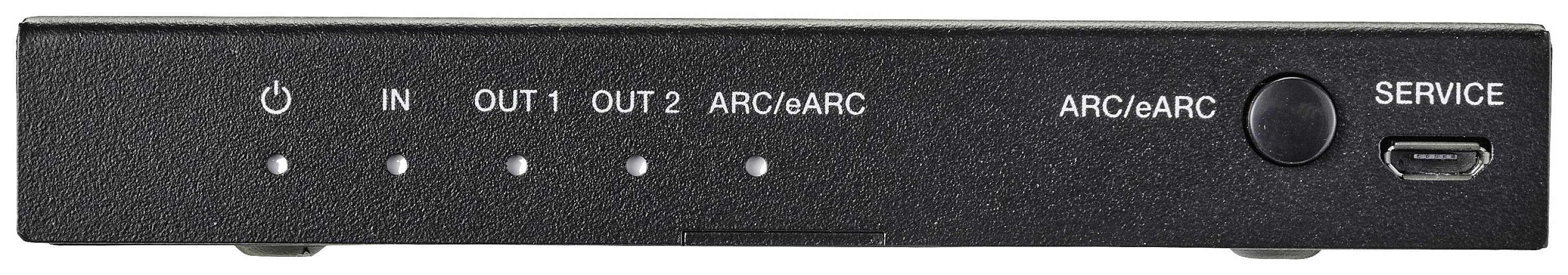 A small black device with multiple ports and buttons, including 'IN', 'OUT 1', 'OUT 2', 'ARC/eARC', 'SERVICE'.