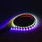 LED strips in various colours illuminate against a dark background. They form a loop and create a colourful light display.