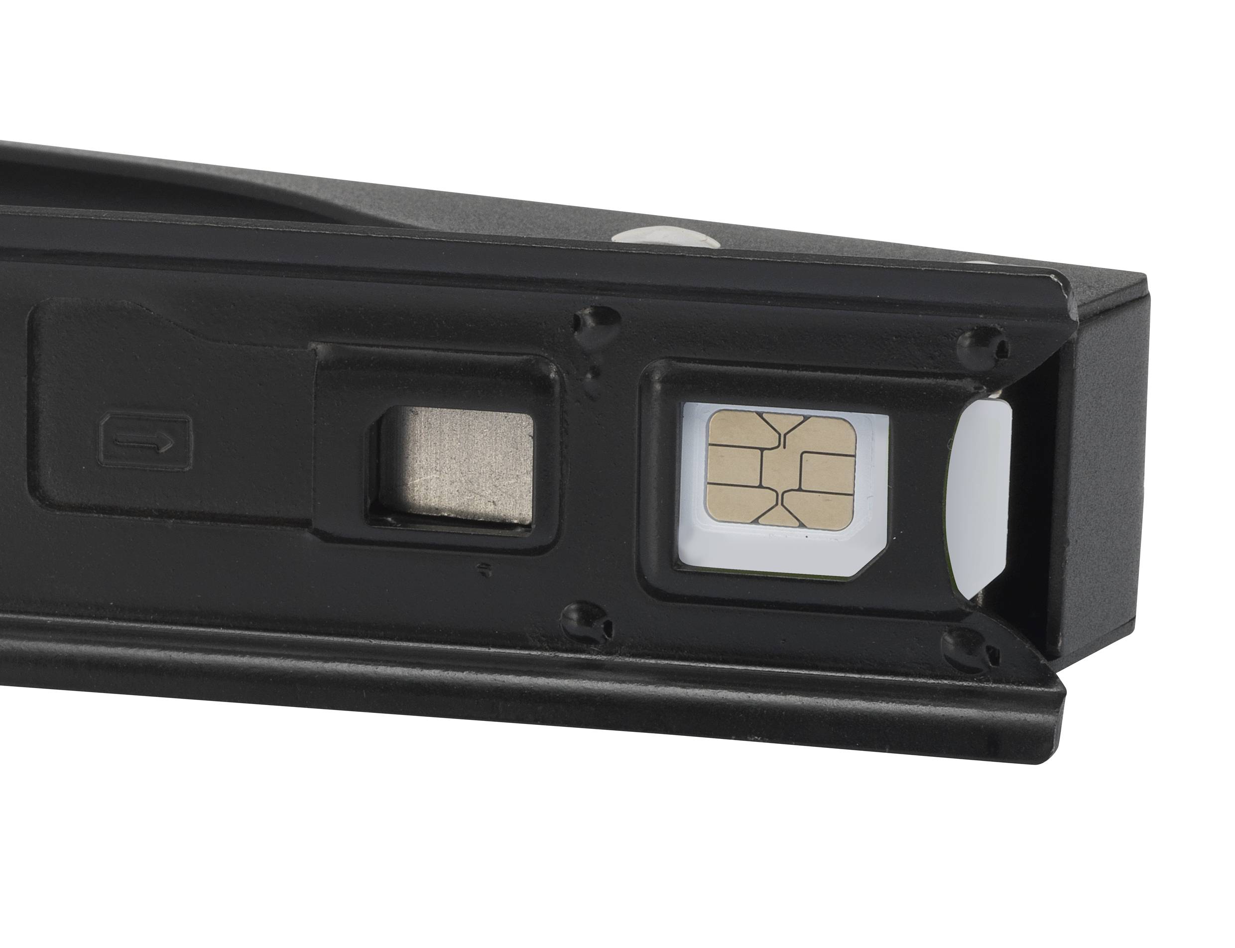 'Close-up of a SIM card in a slot of a mobile device. The card is ready for installation or use.'