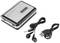 Cassette player with headphones and USB cable.