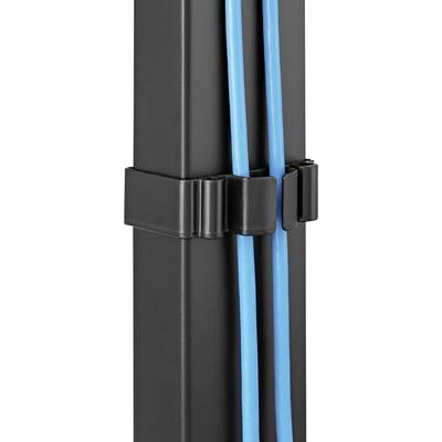 A black cable trunking organises and conceals two blue cables against a wall.