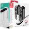 A packaging for a Nintendo Switch Joy-Con charging station with product illustration, showing the charger with Joy-Cons attached.