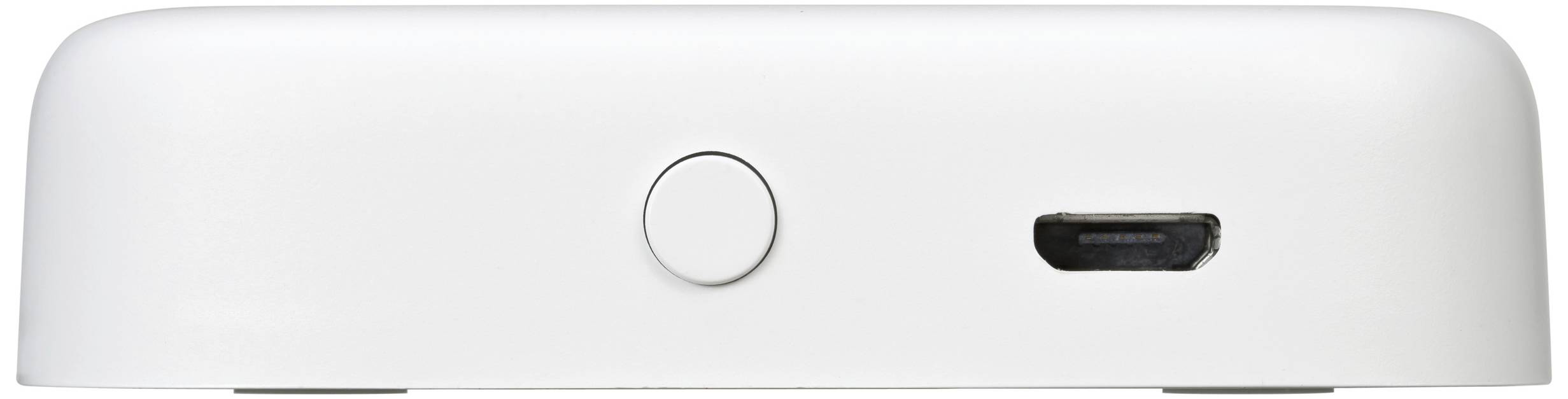 A white, rectangular device with a round button in the centre and a socket on the right.