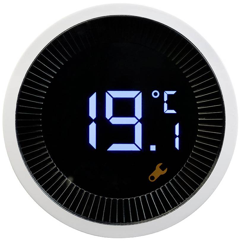 Round digital thermostat displays '19.5 °C' in blue text on a black background. Spanner symbol located in the bottom right corner.