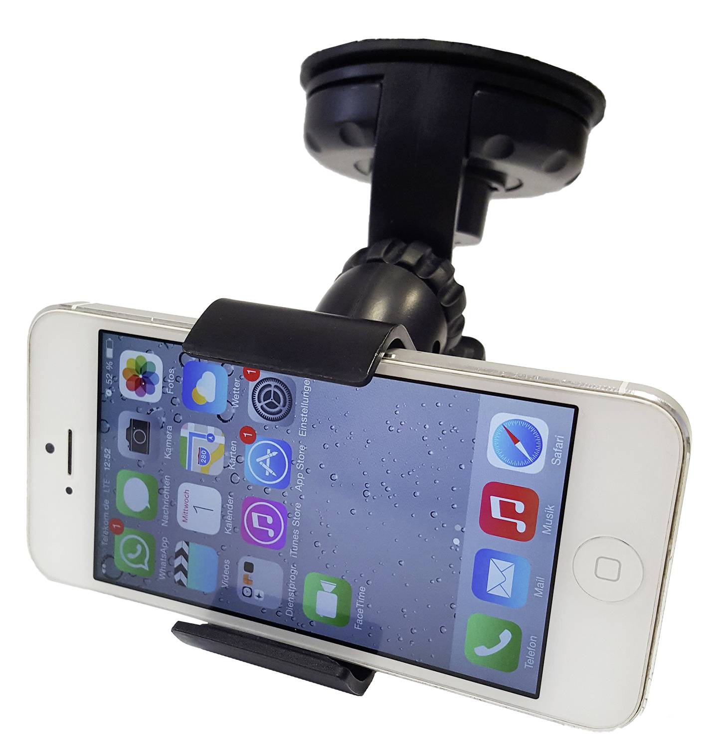 A smartphone is mounted in a holder that is attached to a smooth surface. The display shows various app icons.