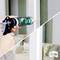 'A person is sealing the white edge of a window with a silicone gun to make it weatherproof.'