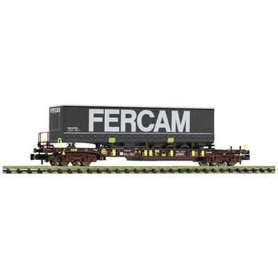 A goods wagon with a large container from the Fercam company, standing on a railway track. The container is black with white lettering.