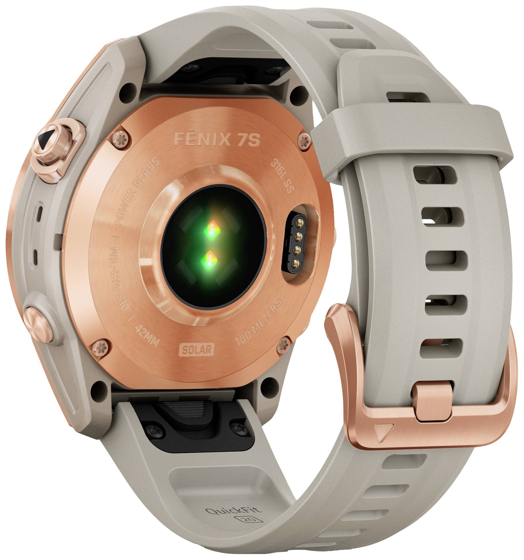 The back of a sports watch with a grey strap and copper-coloured reverse shows a heart rate sensor and charging ports.