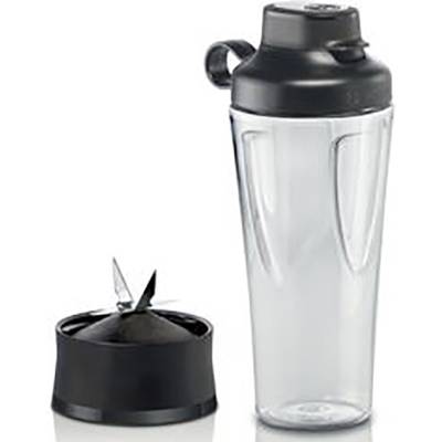 A transparent blender attachment with a black lid and blade attachment, standing on a smooth surface.