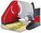 An electric slicing machine in red and silver cuts fruit slices over a collection tray.