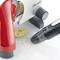 'Graef Food Slicer' cuts bread; crumbs are on the table. Red lever and black adjustment knobs visible.