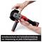 A hand is holding an angle grinder with a red handle and adjustable disc guard. Text: 'Disc guard with quick adjustment for adapting to any working position'.