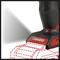 Drill in use, red and black handles, holes being drilled. Hatched contours indicate the drilling process.