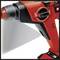Cordless drill in close-up, red casing, side controls visible.