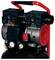 Portable air compressor with red handle, dual motor housings, pressure gauges, and red vent cover on a black tank<br>