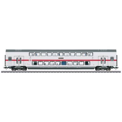 Double-decker passenger carriage of Deutsche Bahn in white with red stripes, standing on railway track, side view.