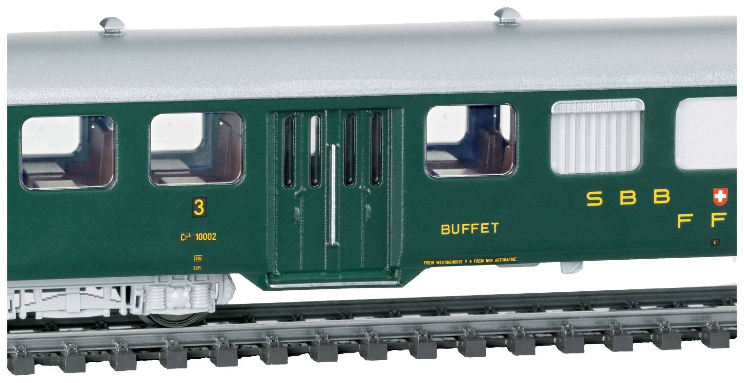 Model railway carriage of SBB CFF with 'BUFFET' labelling. Green carriage with detailed windows on railway tracks.