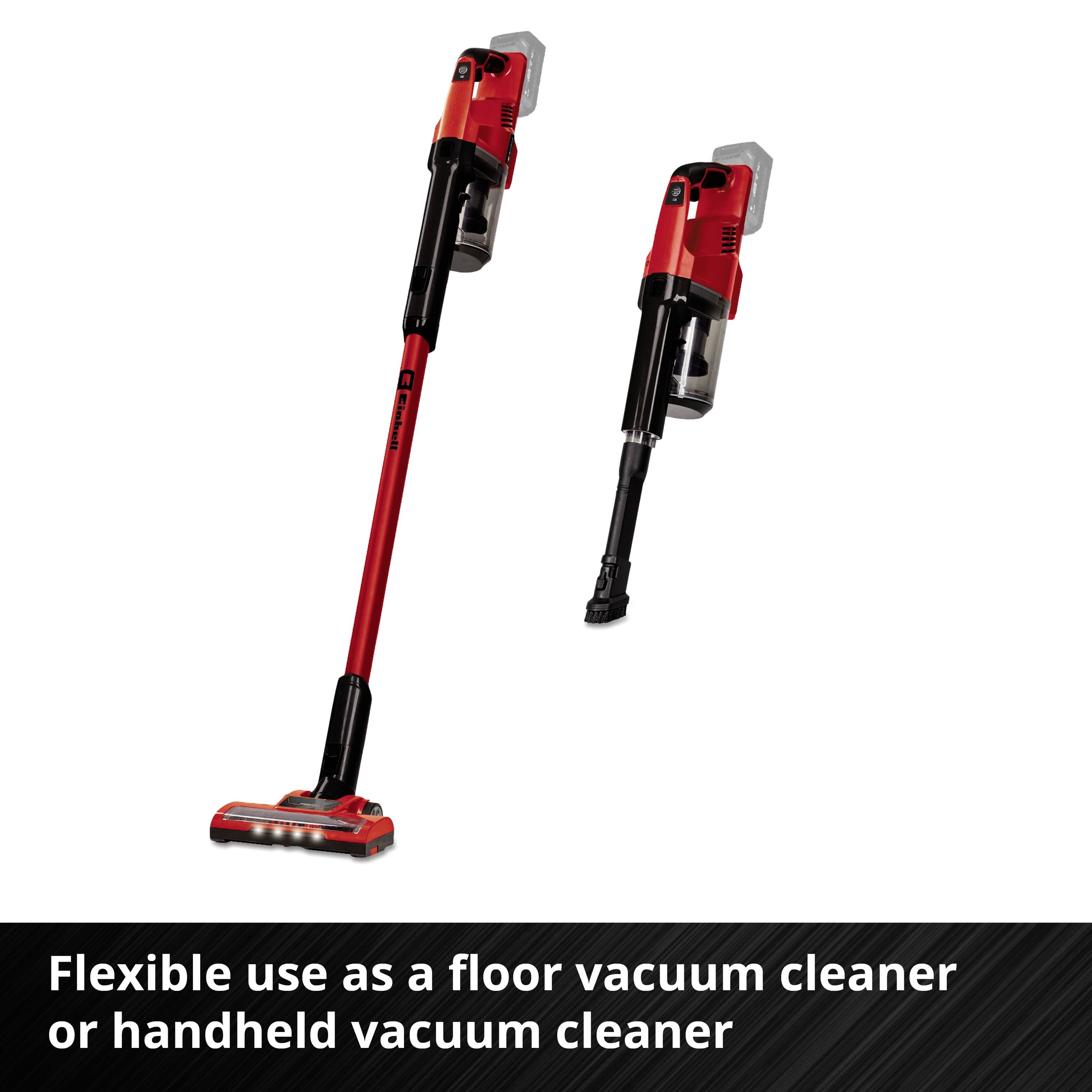 'Versatile for use as a floor vacuum and handheld vacuum cleaner.' Red vacuum cleaner with detachable handheld part, leaning vertically.