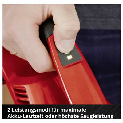 Hand holding red cordless vacuum cleaner; advisory text below: '2 power modes for maximum battery life or highest suction power'.