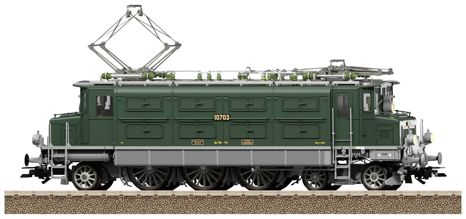 A green electric locomotive on a railway track, side view. Paintwork with the number '10703'. Traditional design.