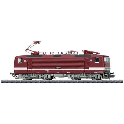 A red model railway locomotive of the DR with a pantograph on the tracks.