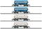'Three goods wagons with coloured tank tops, on railway tracks. The upper two wagons are blue, the lower wagon is white.'
