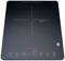 Black induction hob with digital display, showing '1800 W'. Control buttons: power, temperature, timer.