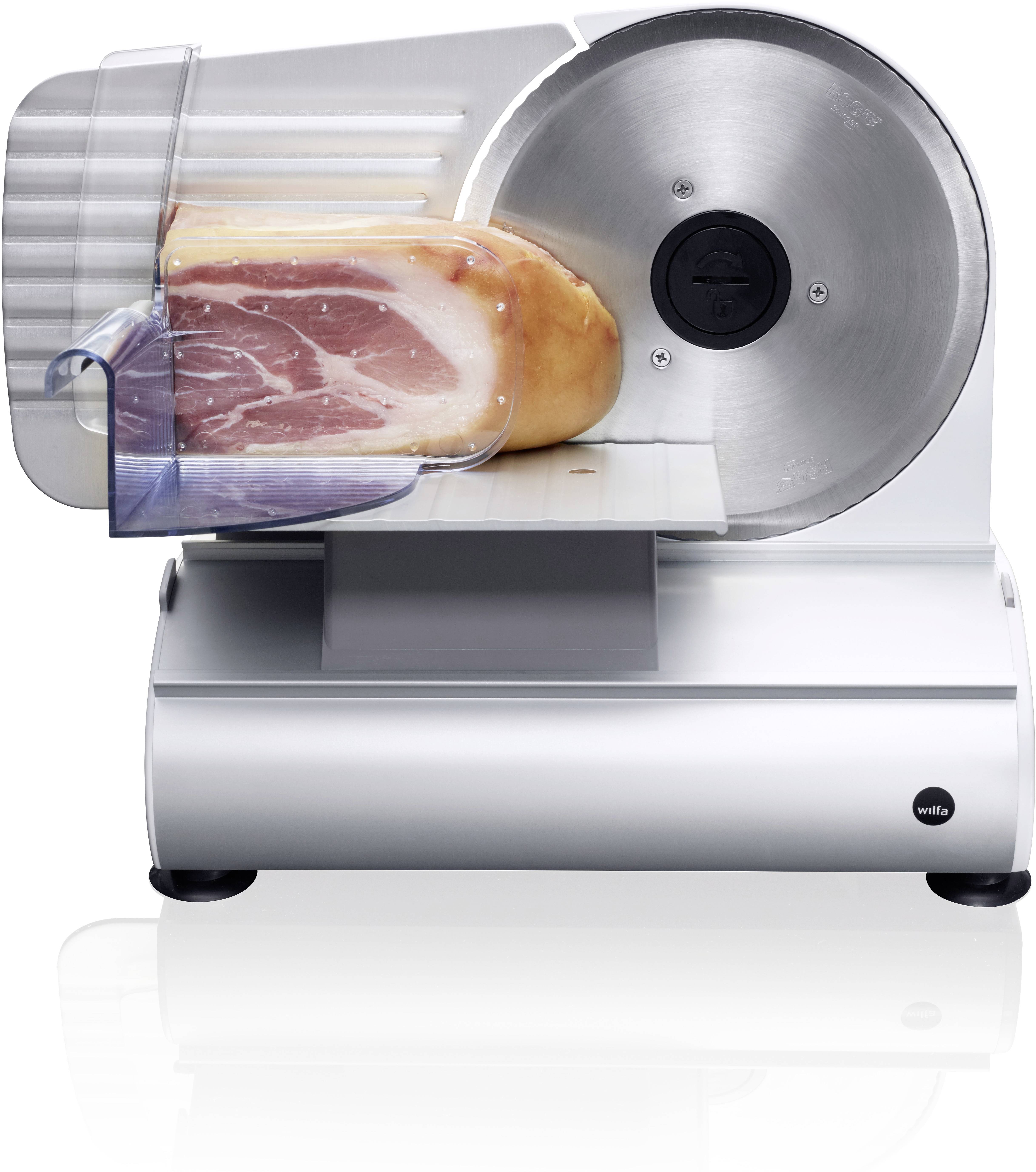 A silver mandolin slices a piece of ham.
