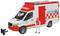 Ambulance toy model in bright red and white colours. A figure standing beside it wearing a rescue vest.