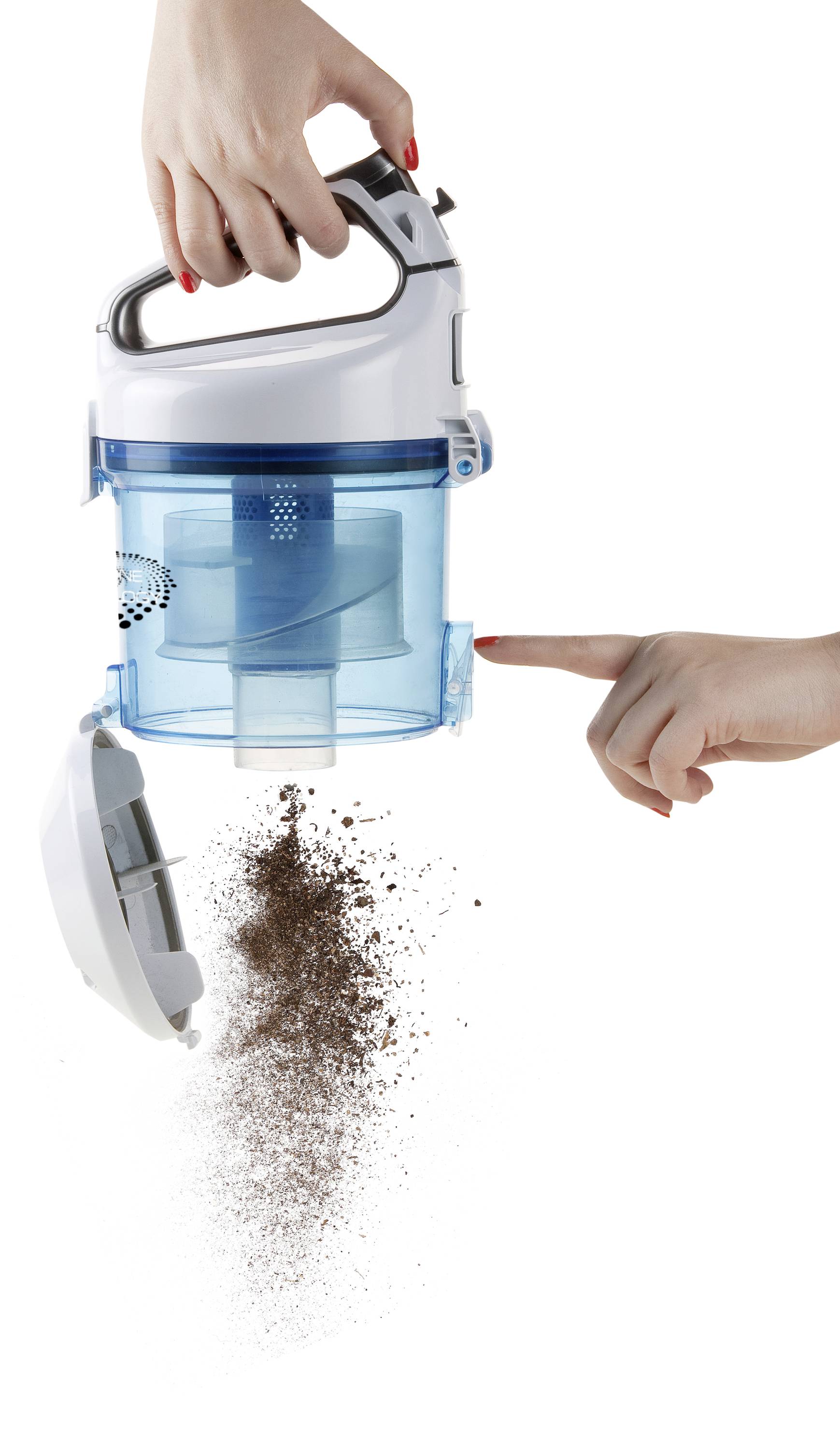 A hand holds a vacuum cleaner container, while another hand opens the outlet to release dirt.