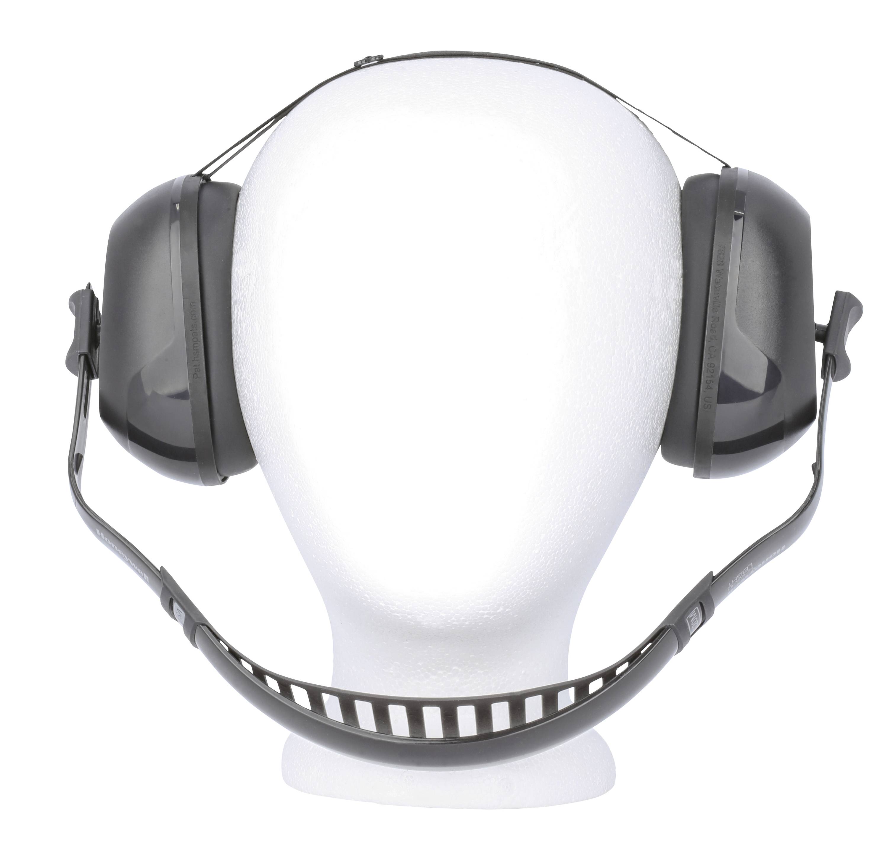 A white polystyrene mannequin head is wearing black ear defenders.