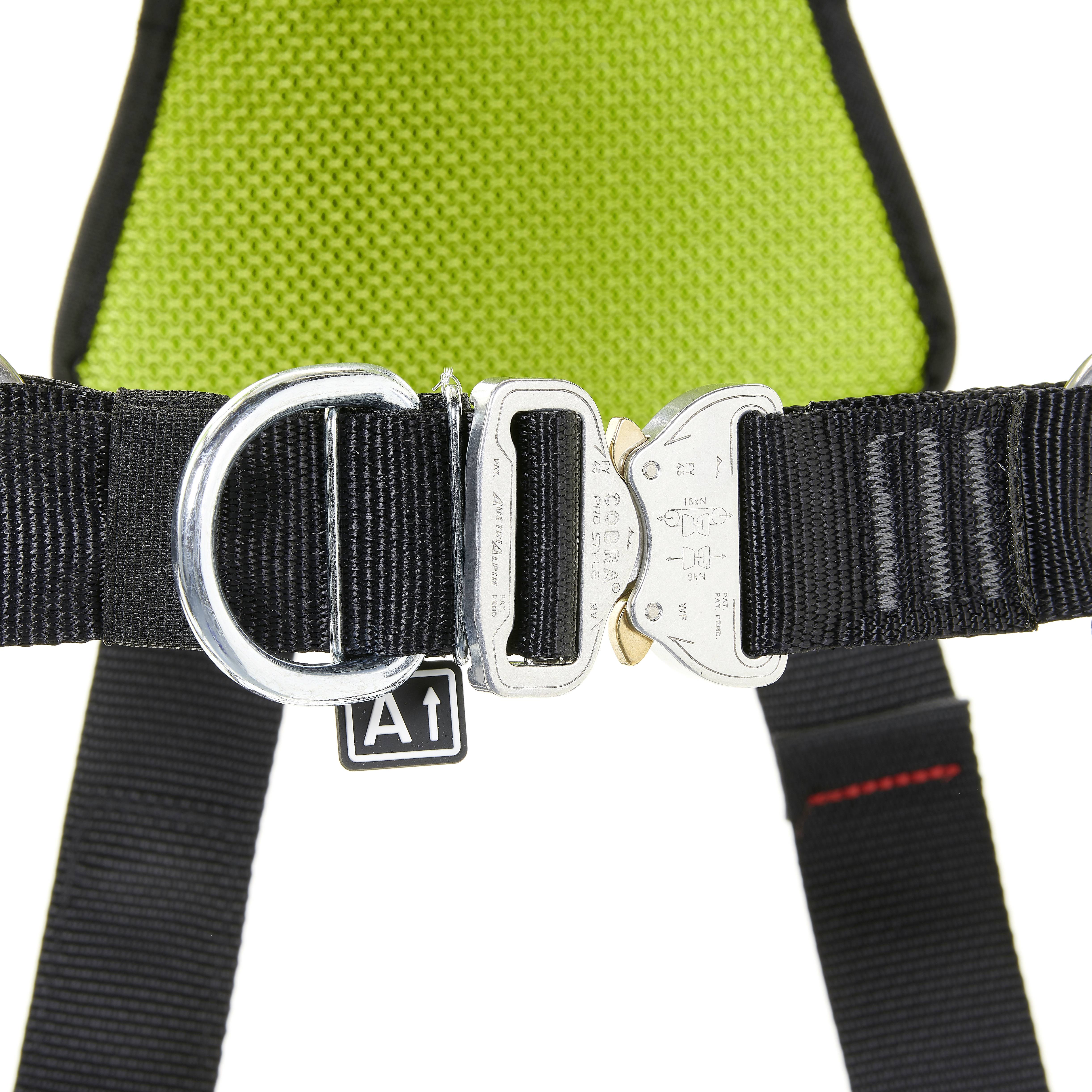 A safety belt with a green pad and silver metal buckle. The belt has black straps and a label reading 'A1'.